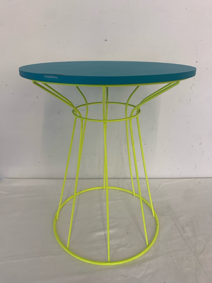 SMALL TEAL TOP NEON GREEN TABLE.