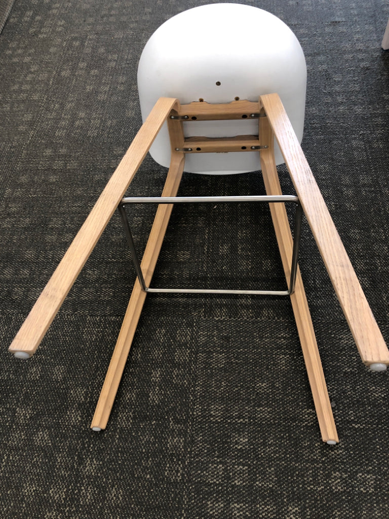WHITE STOOL CONTEMPORARY W/BLOND WOOD LEGS & WIRE REINFORCED.