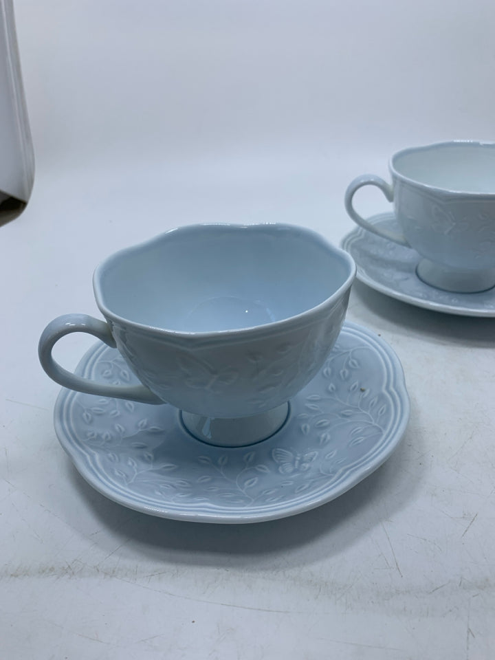 4 PC SVC 2 TEACUP & SAUCERS EMBOSSED BUTTERFLIES RETIRED.