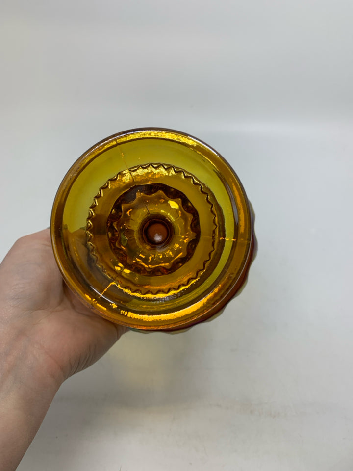 FOOTED AMBER IRIDESCENT GLASS W/ THUMB PRINT.