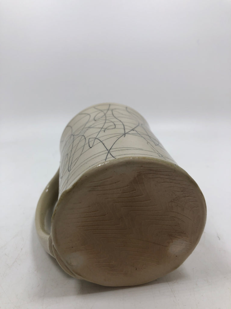 ARTISTS SCRIBBLE CERAMIC MUG.