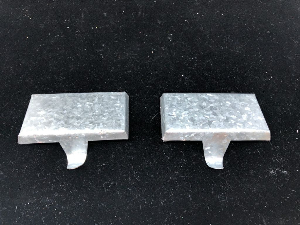 2 GALVANIZED METAL STOCKING HOLDER.