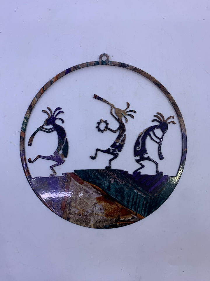 DECORATIVE METAL CIRCLE W 3 KOKOPELLI FIGURES.