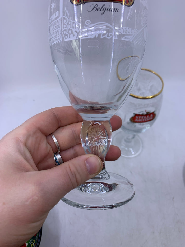 2 STELLA ARTOIS BEER GLASSES GOLD RIM.