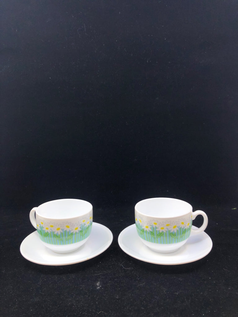 2 WHITE DAISIES TEA CUP AND SAUCERS.