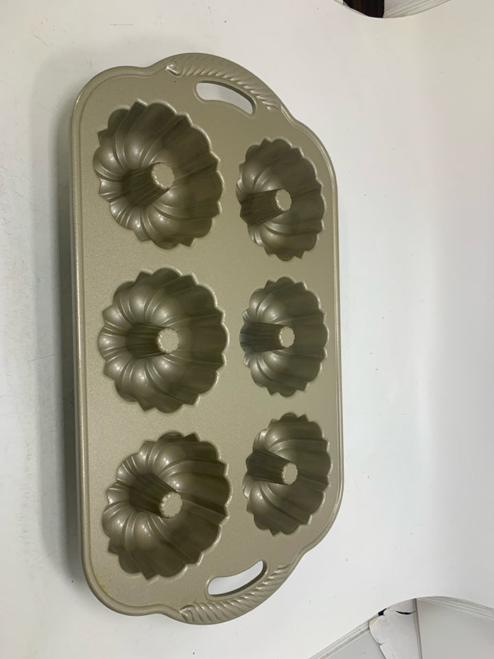 65TH ANNIVERSARY MINI BUNDT 6 CAVITY CAST ALUMINUM PAN.