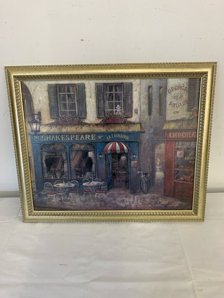 "SHAKESPEARE" STORE FRONT PAINTING IN GOLD FRAME.