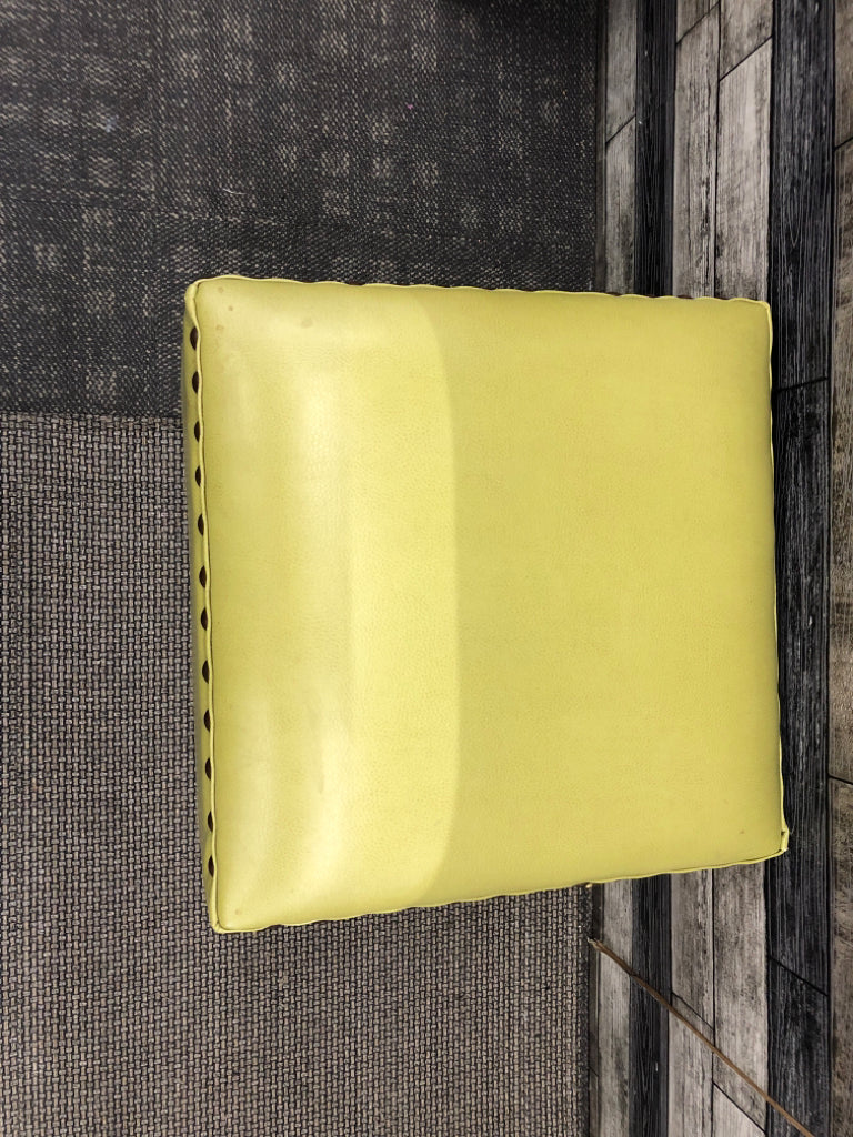 GREEN FAUX LEATHER OTTOMAN.