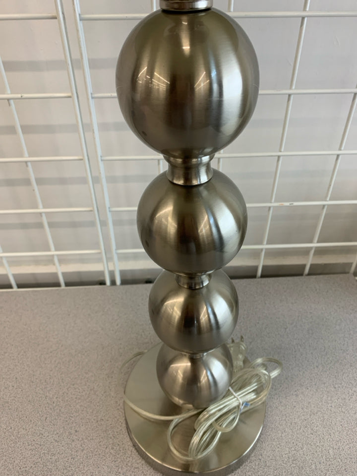 SILVER BUBBLE LAMP W/WHITE BARREL SHADE.