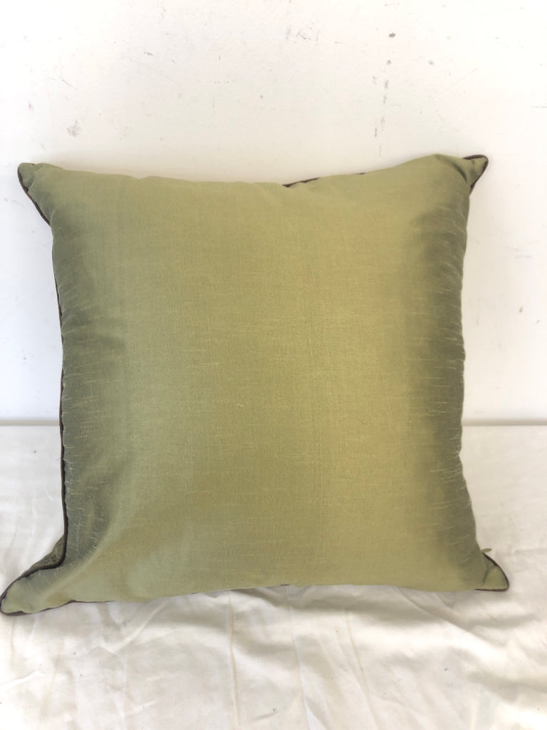 GREEN PILLOW W/  BROWN STITCHED PATTERN.