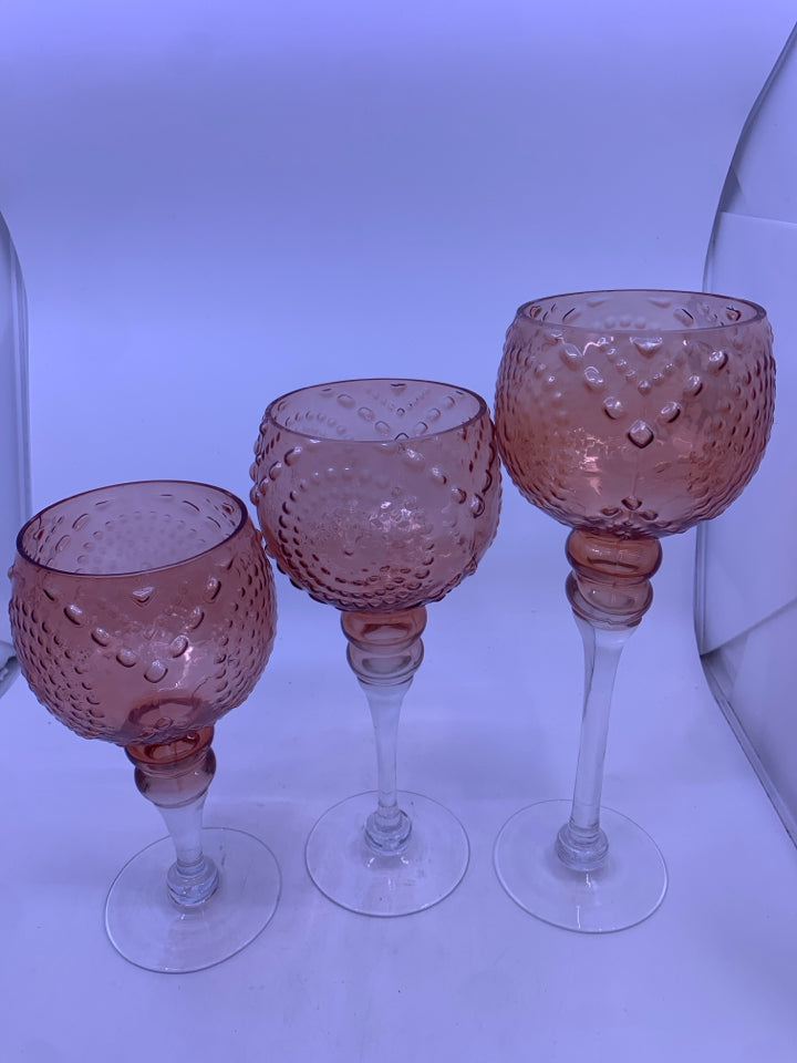 3 PALE PINK EMBOSSED CANDLE HOLDERS.