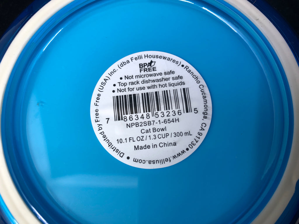 2 THICK PLASTICS CAT BOWLS W/ WHITE INSIDE BLUE OUTSIDE.