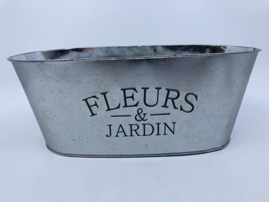 FLEURS & JARDIN OVAL METAL PLANTER.