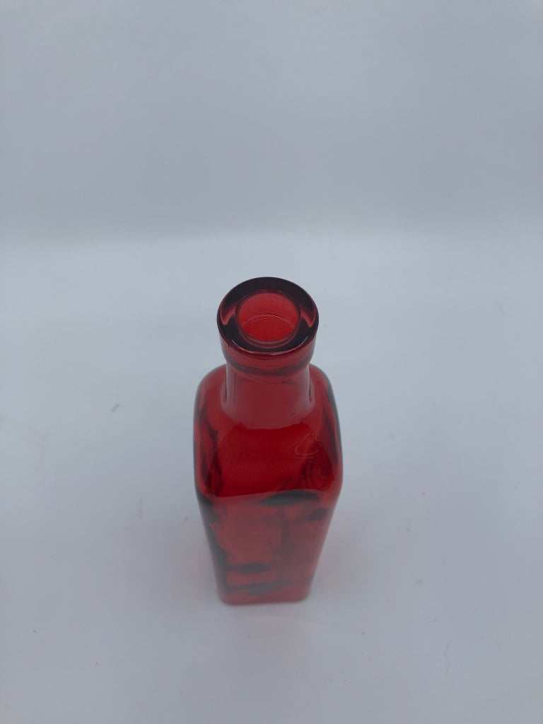 RED GLASS BOTTLE.