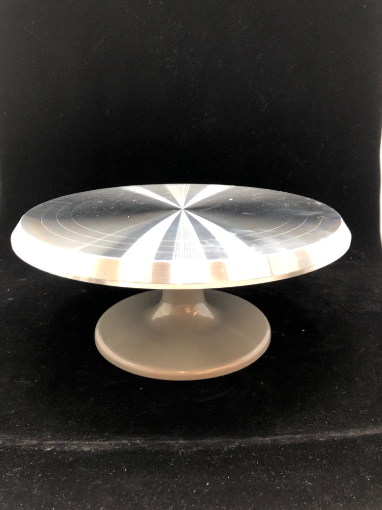SPINNING METAL CAKE STAND.