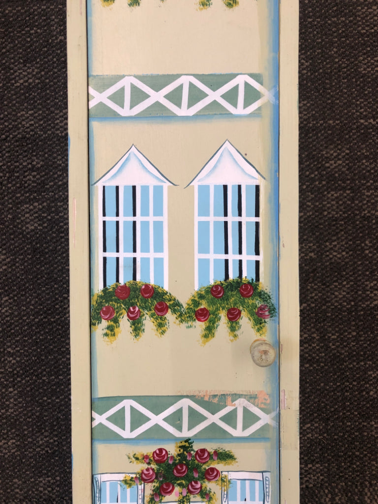 TALL WOODEN HOUSE BOOKSHELF W/PAINTED FLORALS.