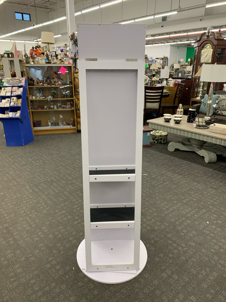FULL LENGTH BODY MIRROR ON SWIVEL W/ JEWELRY STORAGE.