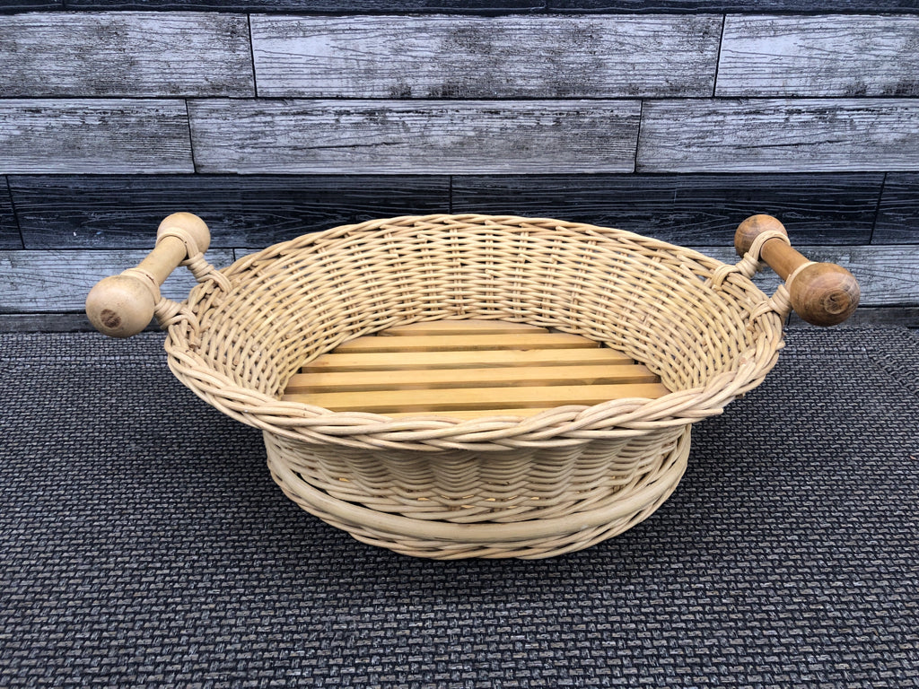 LIGHT WOVEN BASKET W 2 WOOD HANDLES.