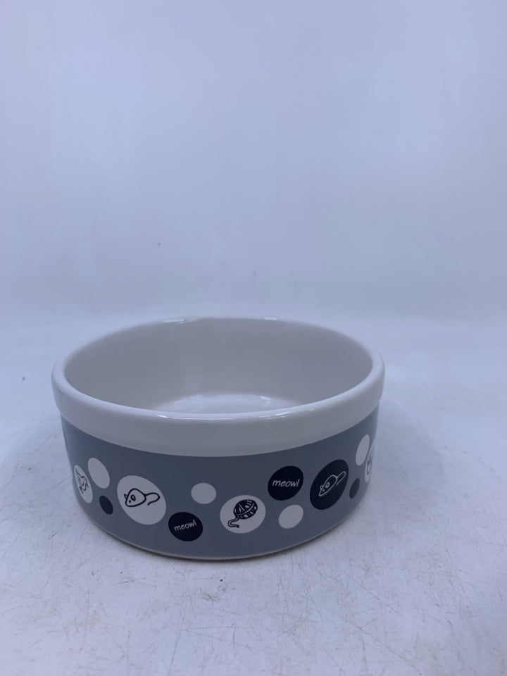 GREY/WHITE CAT BOWL W/ MICE ON OUTSIDE.