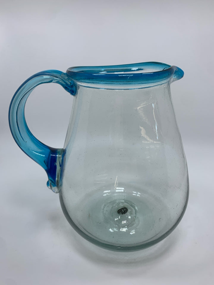 BLOWN GLASS PITCHER W/BLUE HANDLE.