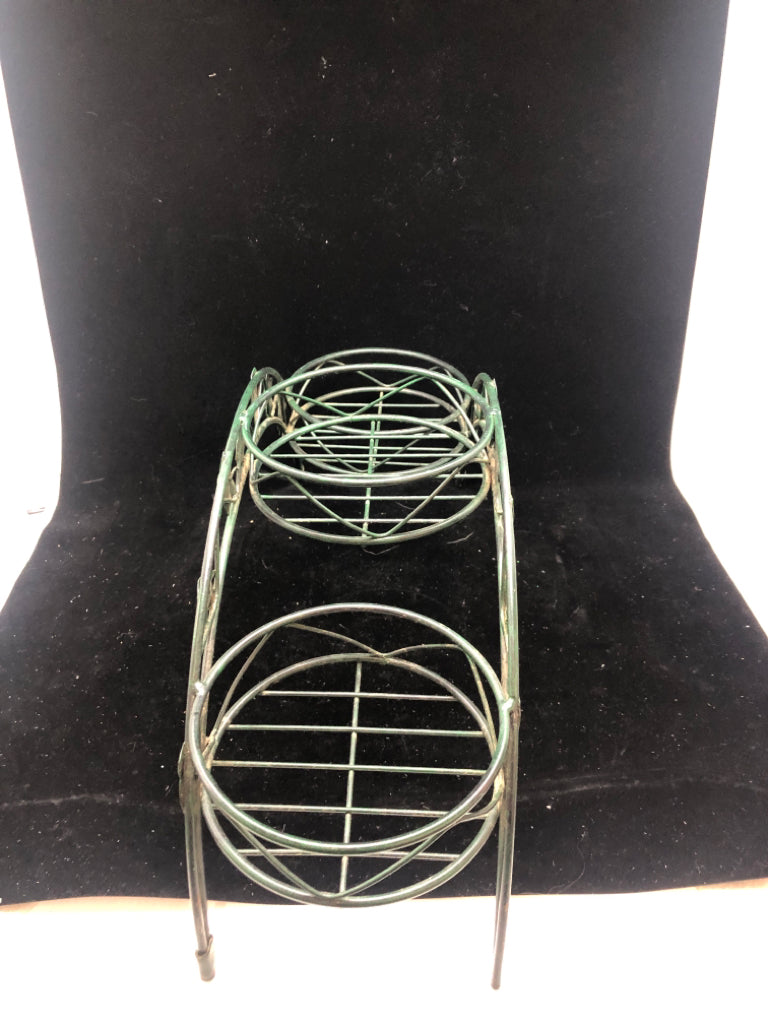 ARCHED LEAF PLANT STAND.