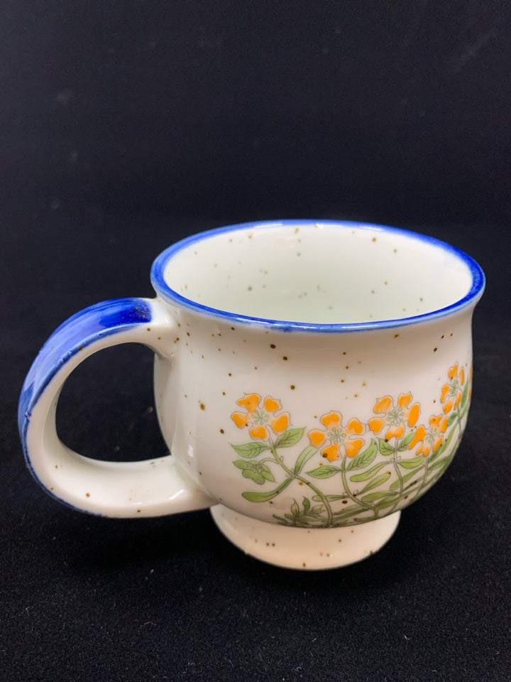 BLUE CERAMIC DOTTED MUG W/ORANGE FLOWERS.