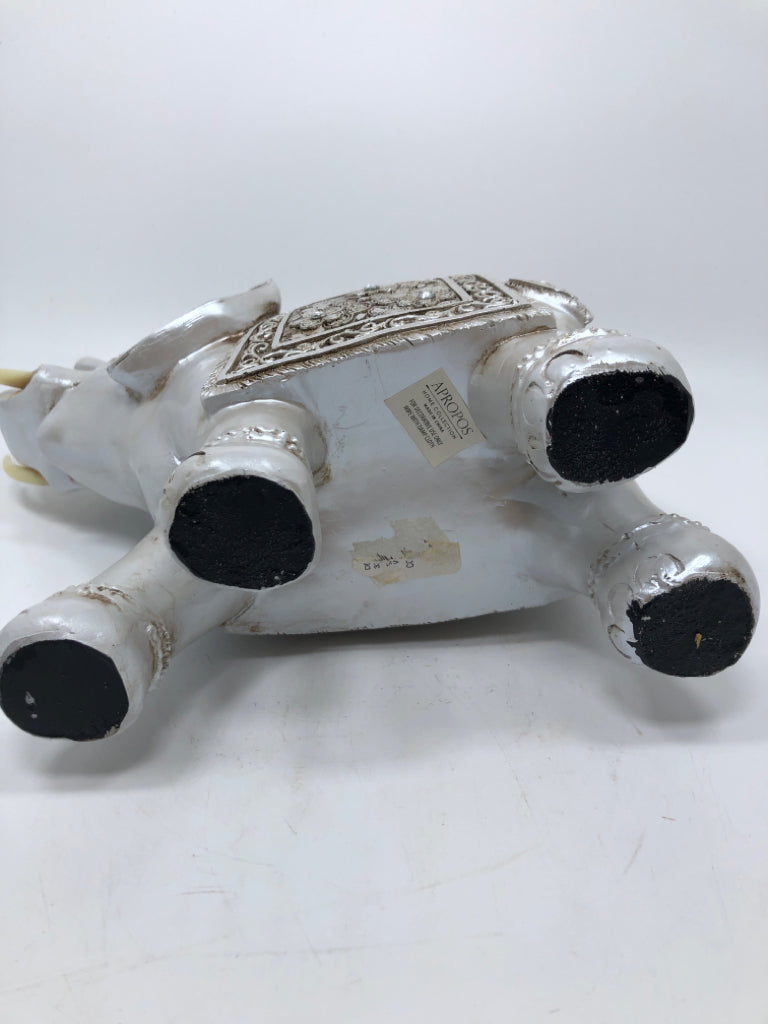 SILVER PAINTED RESIN ELEPHANT.