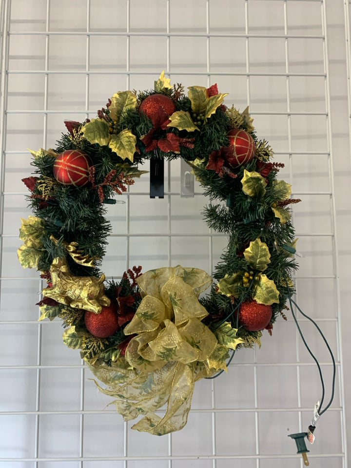 LIGHTED GOLD AND RED WREATH.