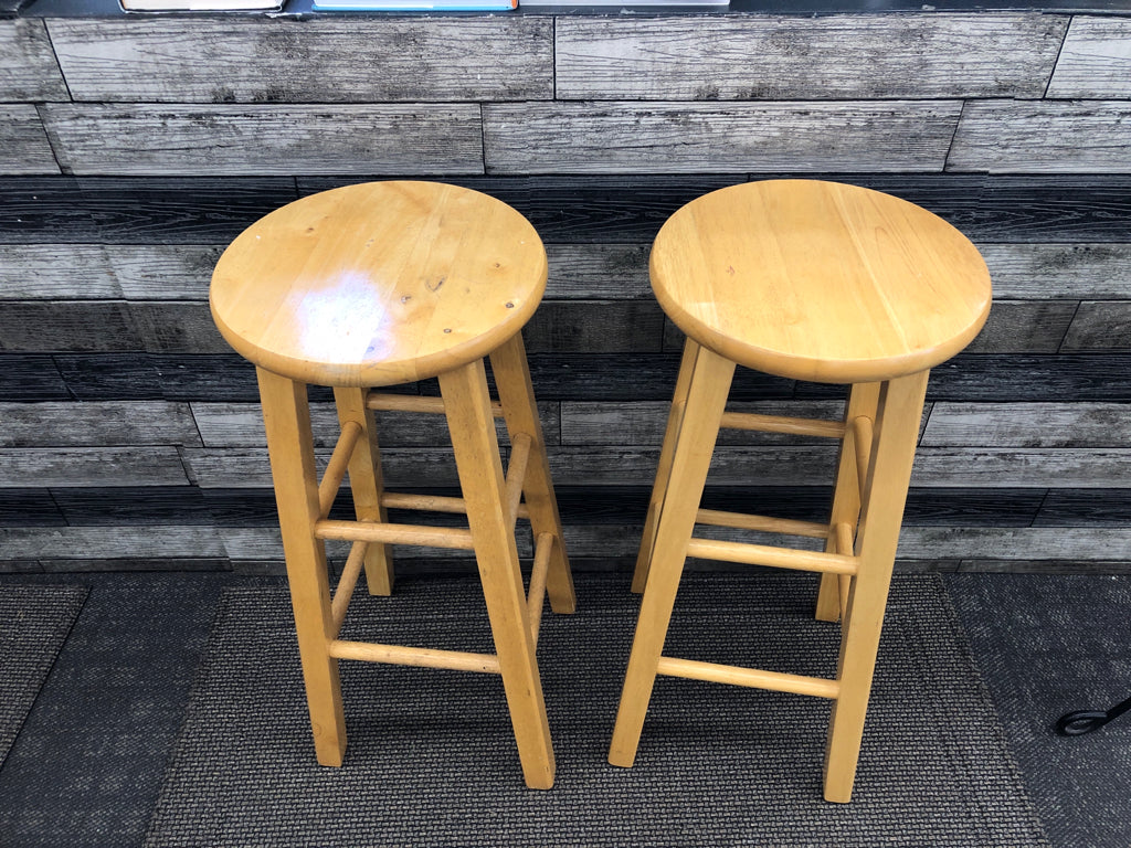 2 BLONDE WOOD STOOLS.