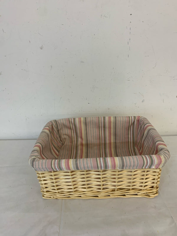 BLONDE WOVEN BASKET W PINK STRIPED LINER.