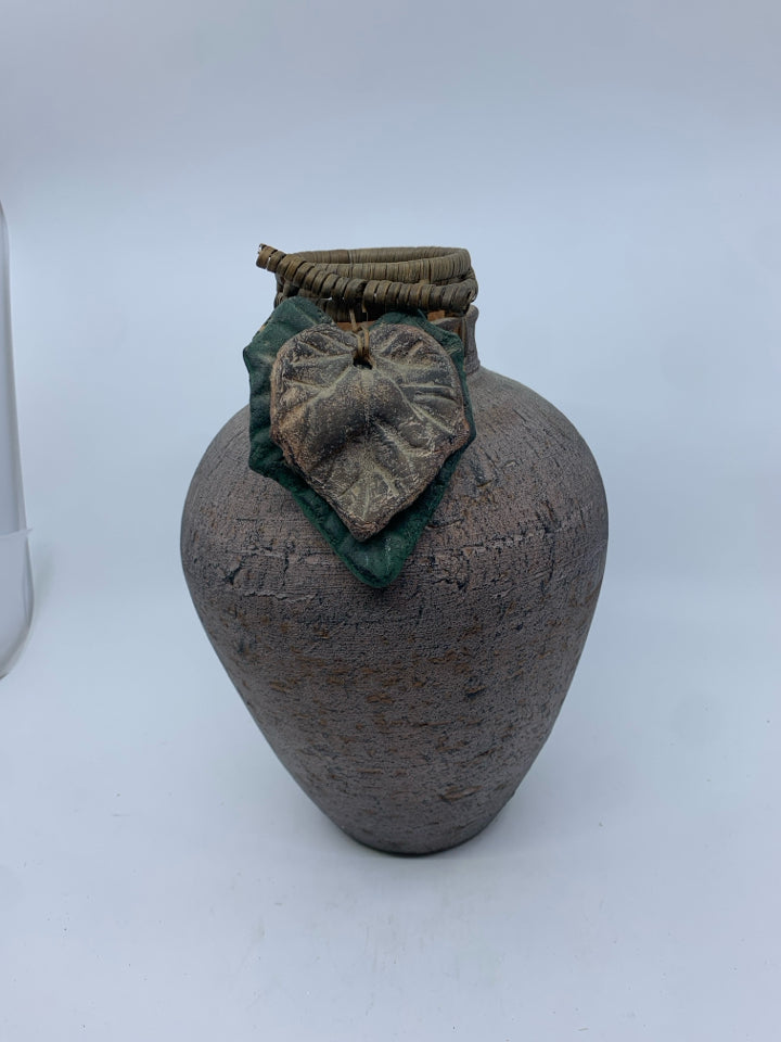 DARK POTTERY VASE W LEAF DECOR.