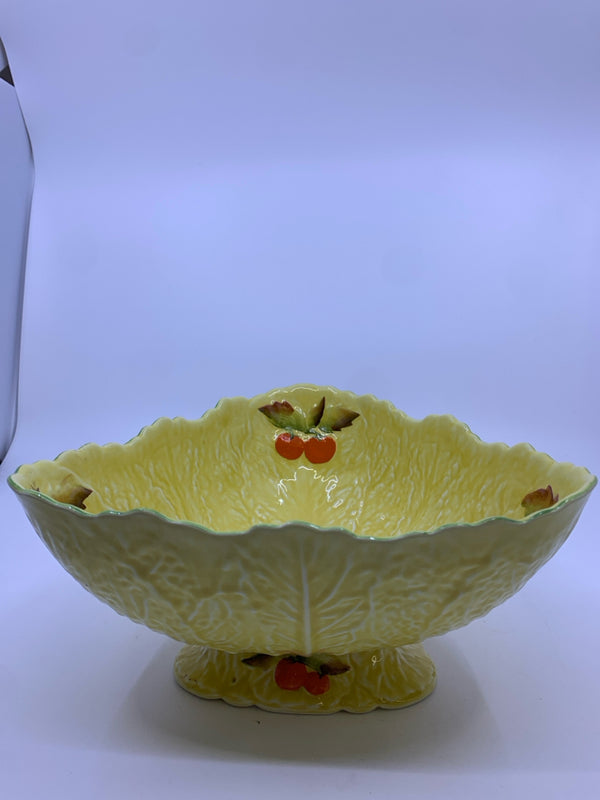 YELLOW LEAF TRIANGLE FOOTED BOWL WITH ORANGES.