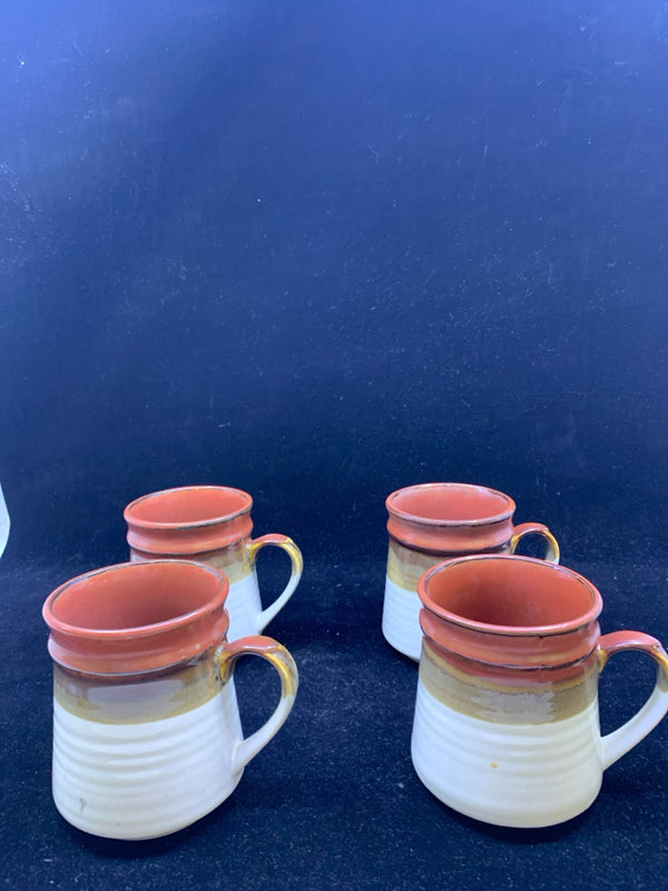 4 RIBBED BROWN AND WHITE POTTERY MUGS.