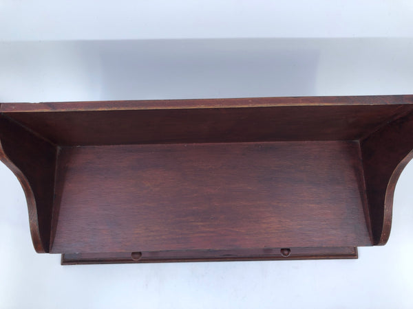SMALL RED WOOD SHELF WITH 2 DRAWER STORAGE.