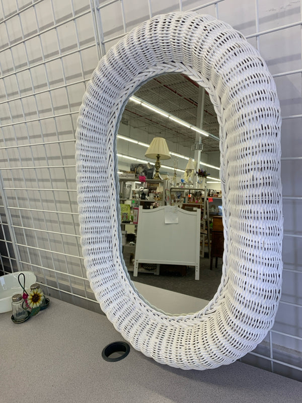 WHITE WICKER OVAL MIRROR WALL HANGING.
