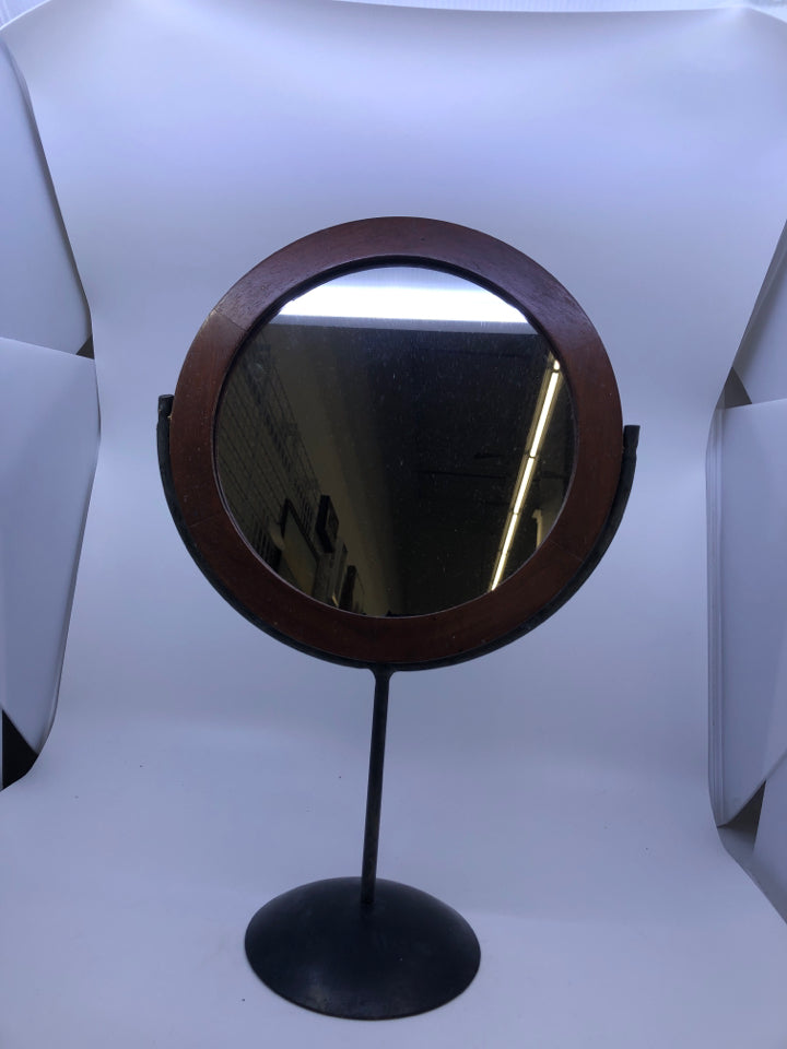 METAL AND WOOD ROUND SWING MIRROR.