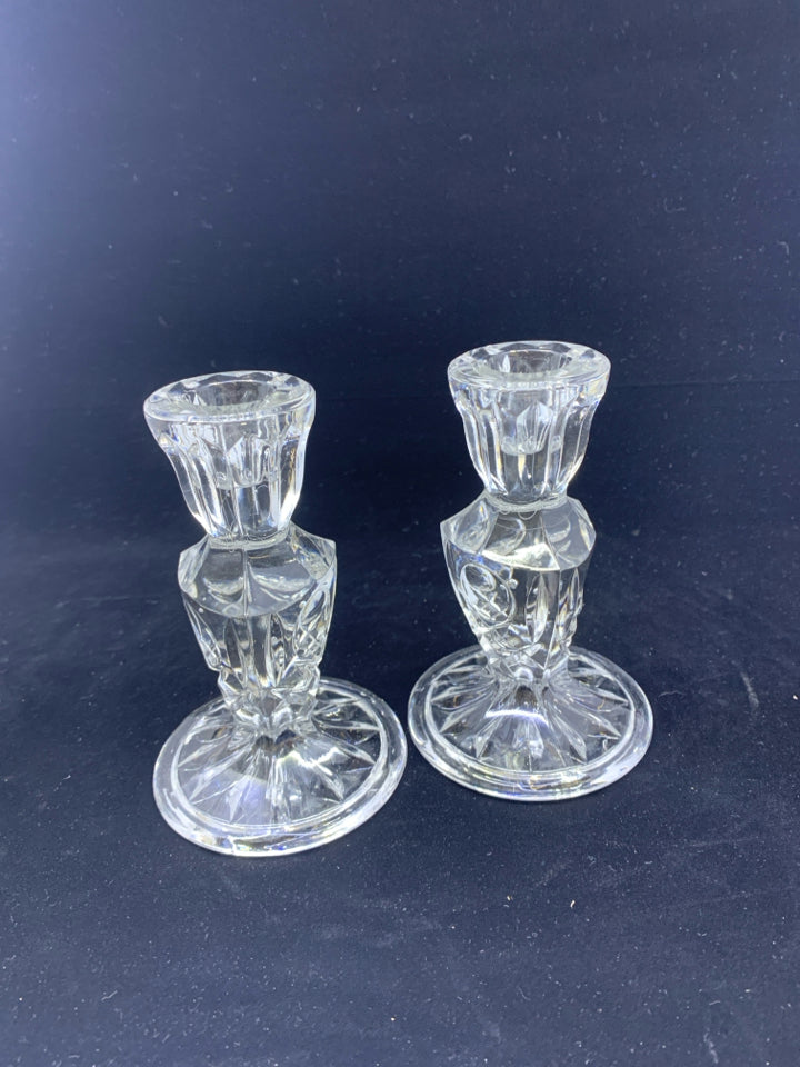 2 PRESSED MIDDLE GLASS TAPER CANDLE HOLDERS.