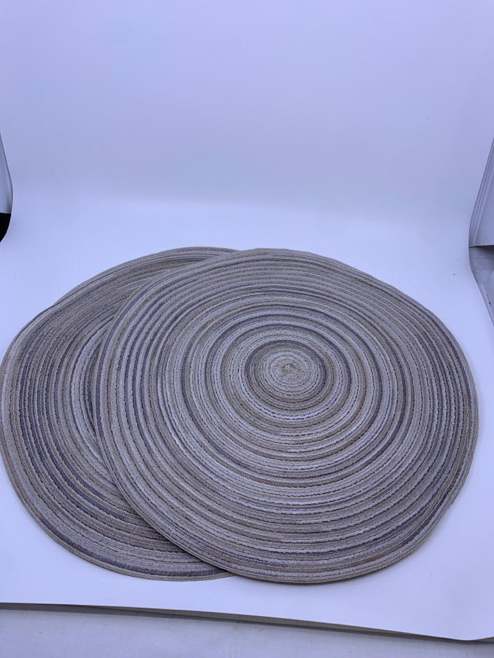 4 ROUND TAN PLACEMATS.