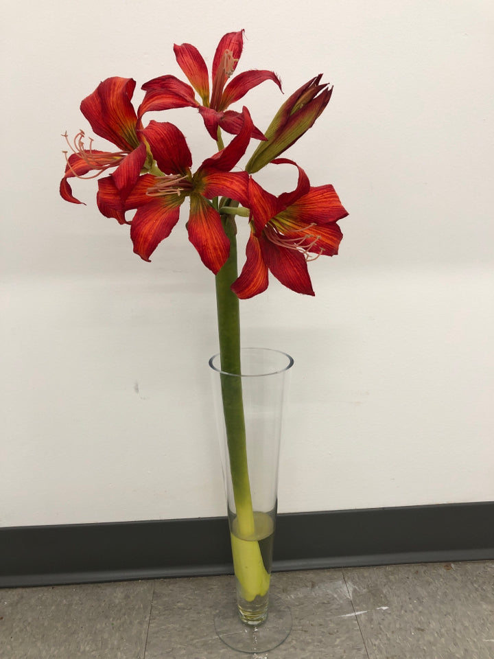 LARGE FAUX RED FLOWERS IN FOOTED VASE.
