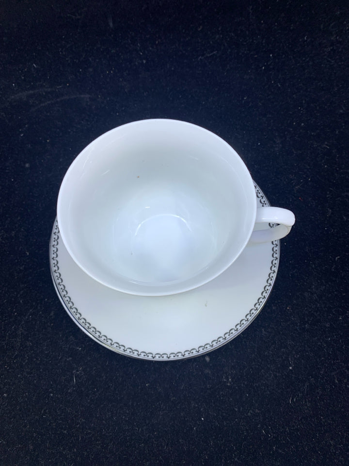 BLACK AND WHITE TEACUP AND SAUCER.