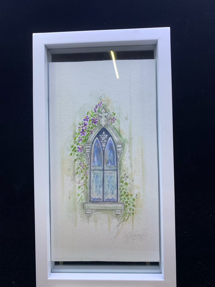 STAINED GLASS WINDOW DRAWING IN WHITE FRAME.