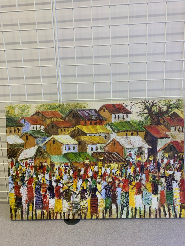 PAINTED PRINT AFRICAN SCENE W/ COLORFUL HOUSES.