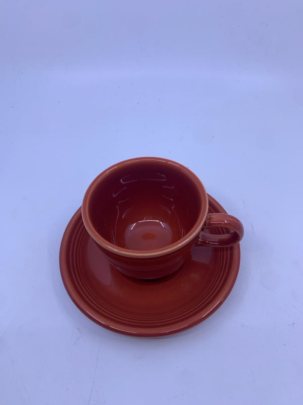 RED/ORANGE FIESTA WARE CUP AND SAUCER.