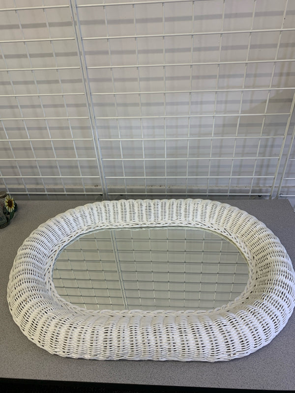 WHITE WICKER OVAL MIRROR WALL HANGING.