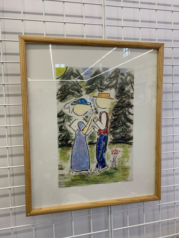 COLORFUL COUPLE IN BLONDE WOOD FRAME.