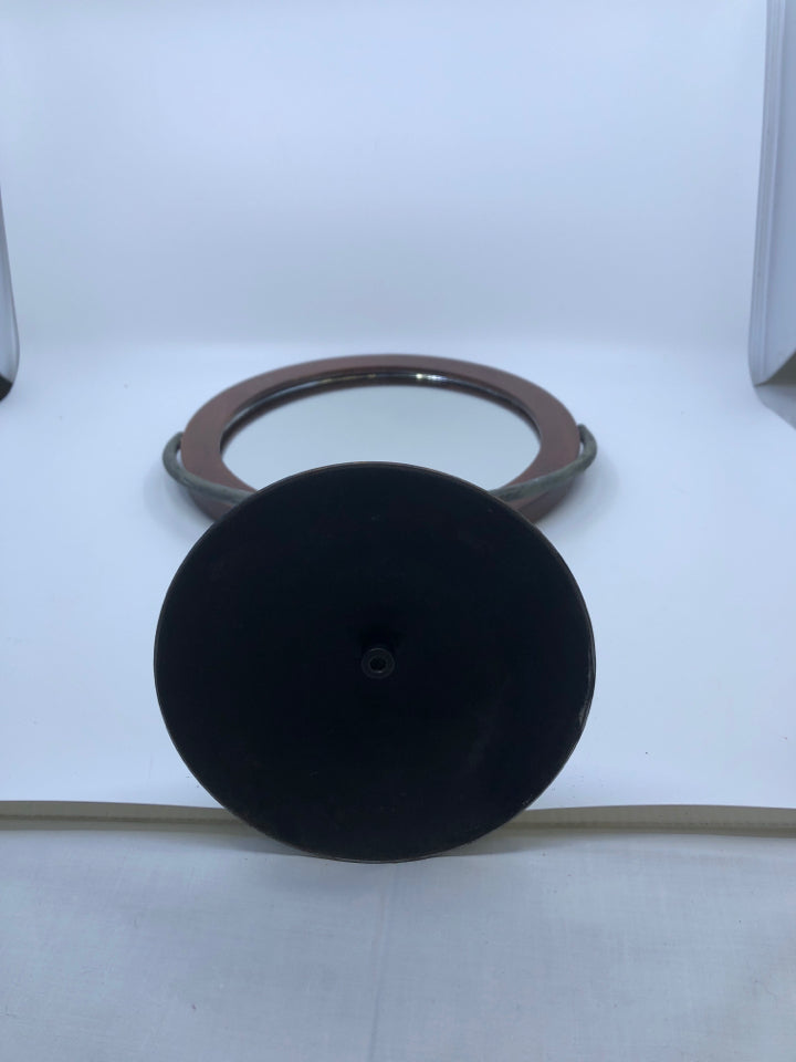 METAL AND WOOD ROUND SWING MIRROR.