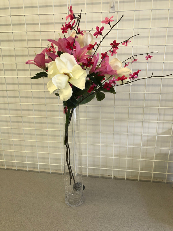 TALL GLASS CRACKLE VASE WITH PINK AND WHITE FLOWERS.