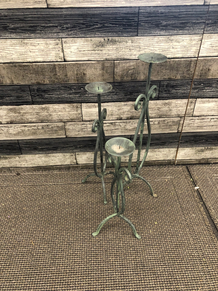 3 GREEN METAL SCROLL CANDLE HOLDERS.