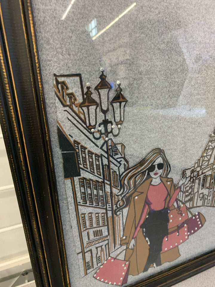 GIRL SHOPPING IN PARIS WALL ART IND DISTRESSED BLACK FRAME.