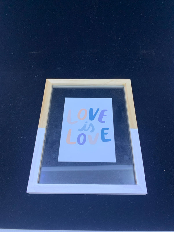 "LOVE IS LOVE" SHADOW BOX WALL ART IN TAN/WHITE FRAME.